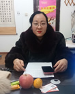 梁女士